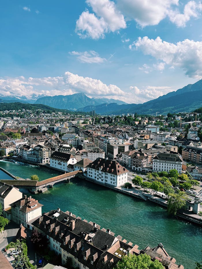 Breathtaking aerial view of Lucerne's picturesque cityscape with the Reuss river.